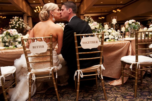 Bride and Groom kissing at reception