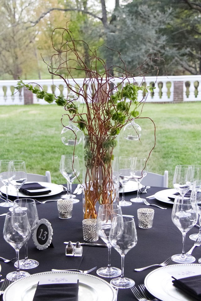 Tall centerpiece with bells or ireland, branches and hanging votives